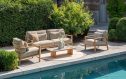 4 Seasons Outdoor Lucas stoel-bank loungeset bij het water.